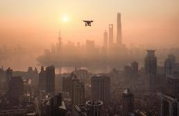 В Китае успешно испытали технологию дистанционной подзарядки дрона лазером